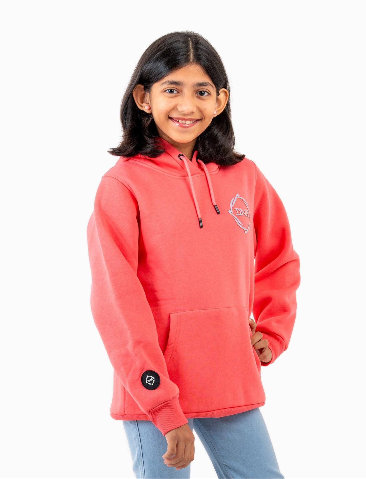 Kids Sports Hoodie in Calypso Coral with brushed fleece lining by What's Your DNA UK | Dream n Aspire